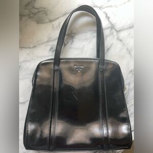 Prada Spazzolato patent leather purse.